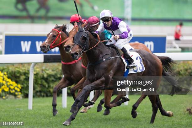 Jockey Chad Schofield riding Rattan wins the Race 3 The Sprint Cup at Sha Tin Racecourse on April 7, 2019 in Hong Kong.