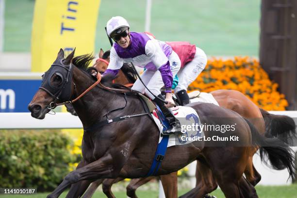 Jockey Chad Schofield riding Rattan wins the Race 3 The Sprint Cup at Sha Tin Racecourse on April 7, 2019 in Hong Kong.