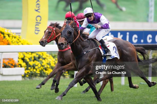 Jockey Chad Schofield riding Rattan wins the Race 3 The Sprint Cup at Sha Tin Racecourse on April 7, 2019 in Hong Kong.