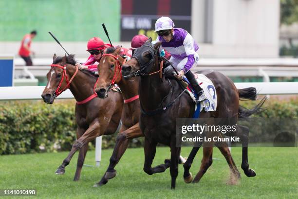 Jockey Chad Schofield riding Rattan wins the Race 3 The Sprint Cup at Sha Tin Racecourse on April 7, 2019 in Hong Kong.