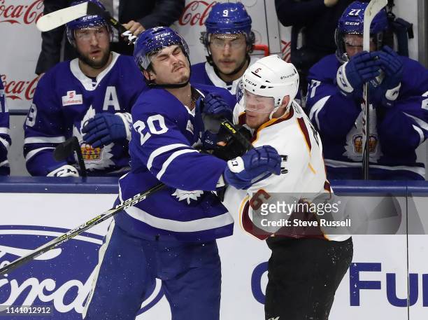 Toronto Marlies left wing Mason Marchment and Cleveland Monsters defenseman Ryan Collins collide as the Toronto Marlies play the Cleveland Monsters...