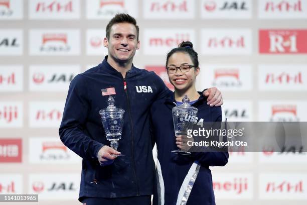 Samuel Mikulak and Morgan Hurd of the United States celebrate as they pose with the 2019 Artistic Gymnastics World Cup Series All-Around Winner cup...