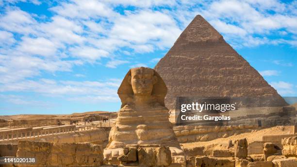 giza pyramids and sphinx in cairo, egypt - giza stock pictures, royalty-free photos & images