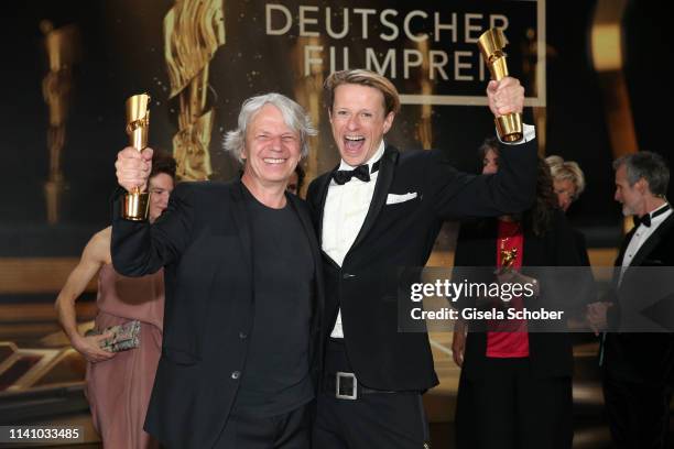 Andreas Dresen and Alexander Scheer with award during the Lola - German Film Award final applause at Palais am Funkturm on May 3, 2019 in Berlin,...