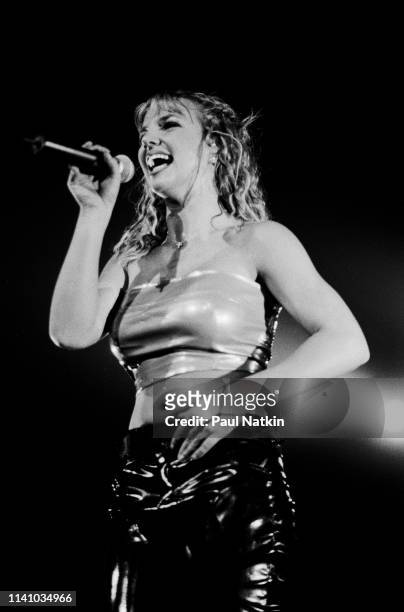 Singer Britney Spears performs on stage at the Rosemont Theater in Rosemont, Illinois, August 3, 1999.