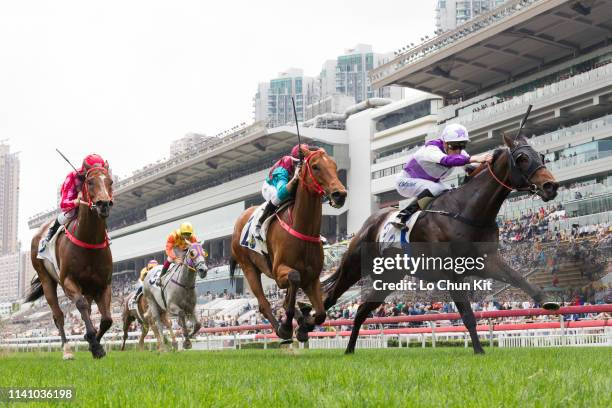 Jockey Chad Schofield riding Rattan wins the Race 3 The Sprint Cup at Sha Tin Racecourse on April 7, 2019 in Hong Kong.