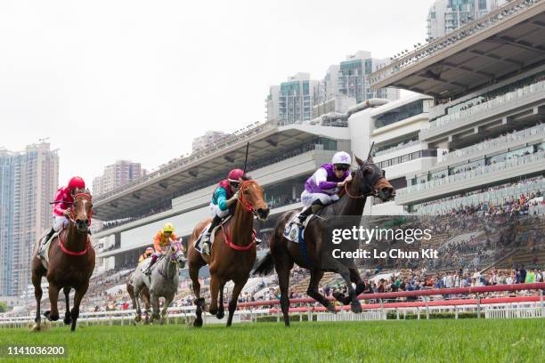 Jockey Chad Schofield riding Rattan wins the Race 3 The Sprint Cup at Sha Tin Racecourse on April 7, 2019 in Hong Kong.