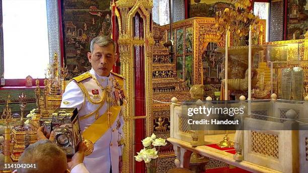 Handout photo from the Public Relations Department for the Coronation of King Rama X showing Thai King Maha Vajiralongkorn during a ceremony before...