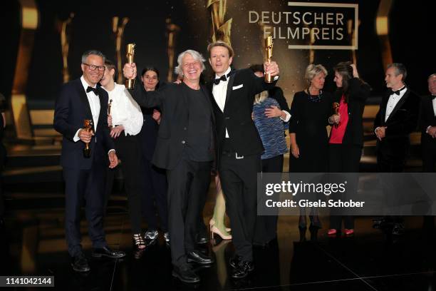 Andreas Dresen and Alexander Scheer with award during the Lola - German Film Award final applause at Palais am Funkturm on May 3, 2019 in Berlin,...