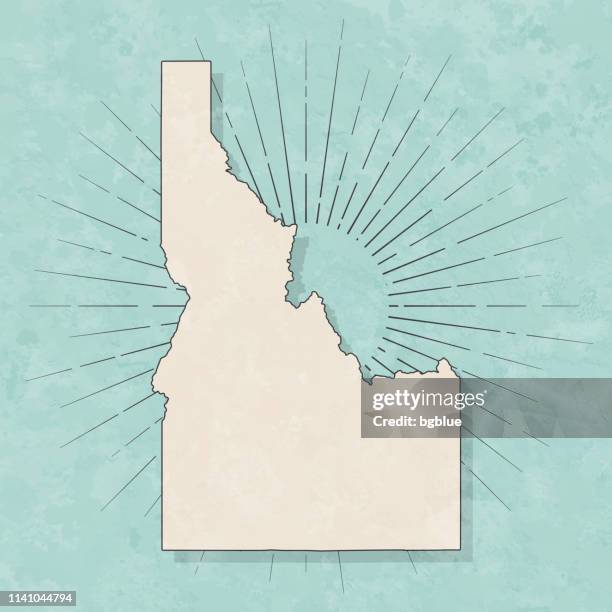 ilustraciones, imágenes clip art, dibujos animados e iconos de stock de mapa de idaho en estilo retro vintage-papel texturizado antiguo - idaho