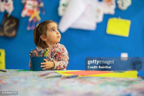 cute child draw with colorful crayons - crayons stock pictures, royalty-free photos & images