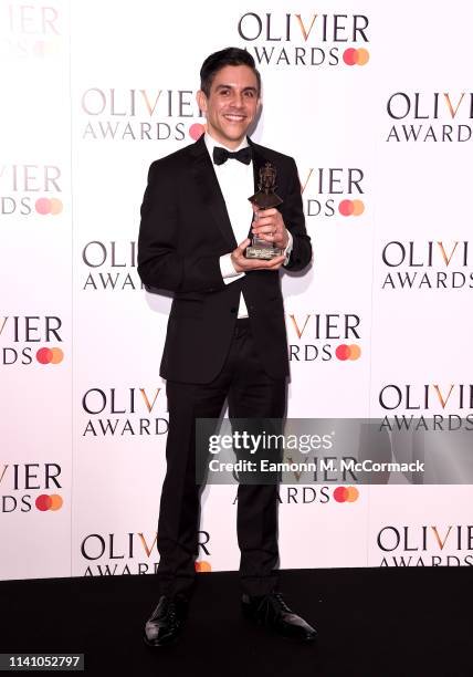 Matthew Lopez with the Best New Play award for 'The Inheritance" during The Olivier Awards with Mastercard at the Royal Albert Hall on April 07, 2019...
