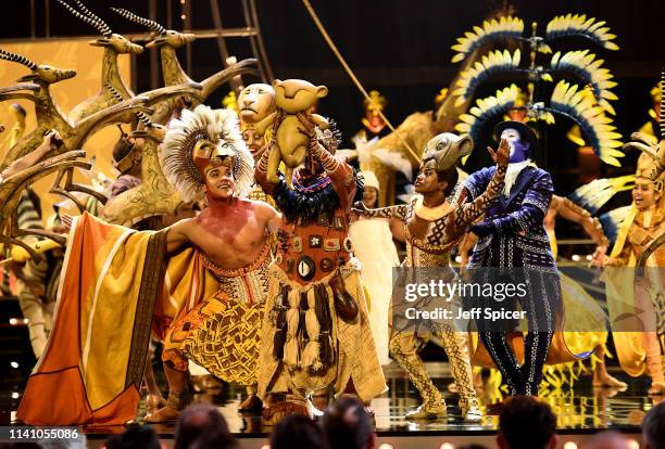 The cast of The Lion King perform on stage during The Olivier Awards 2019 with Mastercard at the Royal Albert Hall on April 07, 2019 in London,...