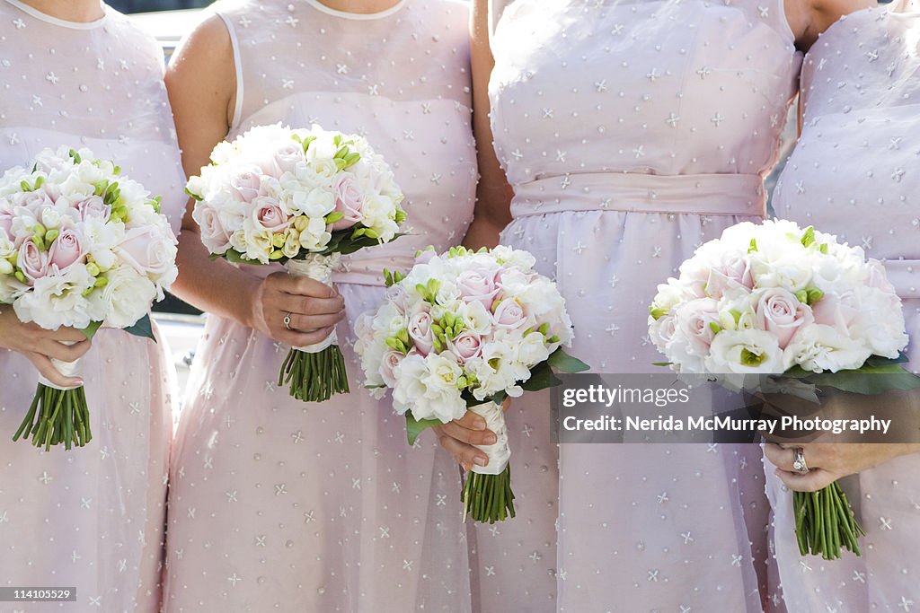 Bridesmaids with bouquets