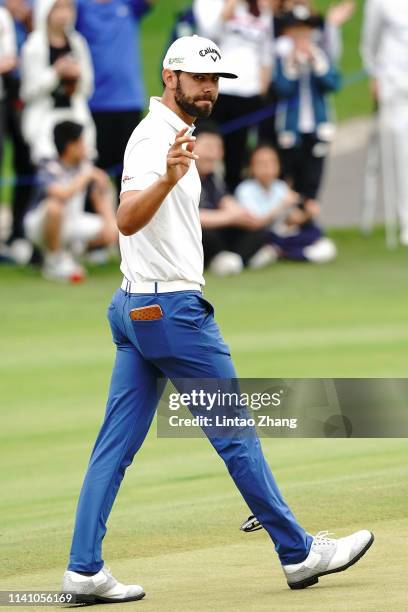 Erik Van Rooyen of South Africa celebrates after after plays a shot during day three of the 2019 Volvo China Open at Genzon Golf Club on May 4, 2019...