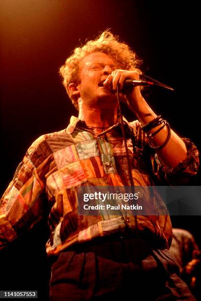 English Pop and R&B singer Mick Hucknall, of the group Simply Red, performs onstage at the Park West, Chicago, Illinois, August 5, 1986.