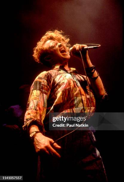 English Pop and R&B singer Mick Hucknall, of the group Simply Red, performs onstage at the Park West, Chicago, Illinois, August 5, 1986.