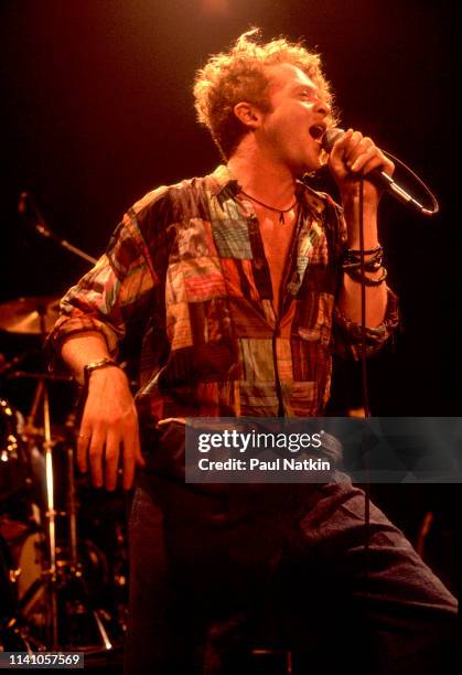 English Pop and R&B singer Mick Hucknall, of the group Simply Red, performs onstage at the Park West, Chicago, Illinois, August 5, 1986.