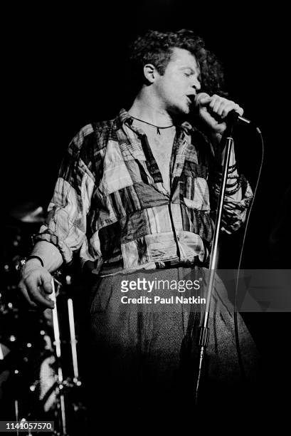 English Pop and R&B singer Mick Hucknall, of the group Simply Red, performs onstage at the Park West, Chicago, Illinois, August 5, 1986.