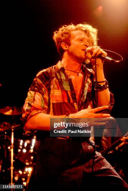 English Pop and R&B singer Mick Hucknall, of the group Simply Red, performs onstage at the Park West, Chicago, Illinois, August 5, 1986.