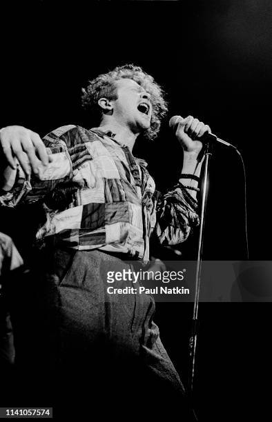 English Pop and R&B singer Mick Hucknall, of the group Simply Red, performs onstage at the Park West, Chicago, Illinois, August 5, 1986.