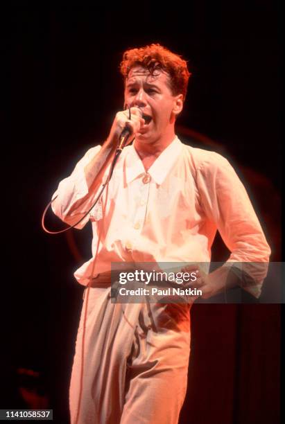 Scottish Rock singer Jim Kerr, of the group Simple Minds, performs onstage at the Poplar Creek Music Theater, Hoffman Estates, Illinois, August 17,...