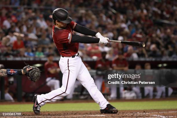 John Ryan Murphy of the Arizona Diamondbacks hits a single against the Boston Red Sox during the third inning of the MLB game at Chase Field on April...