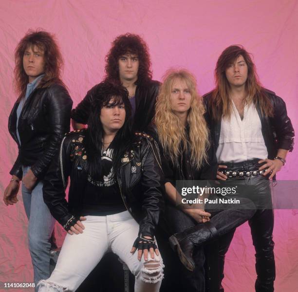 Portrait of American Rock group Shok Paris as they pose against a pink background in a photo studio, Cleveland, Ohio, January 11, 1989. Pictured are,...