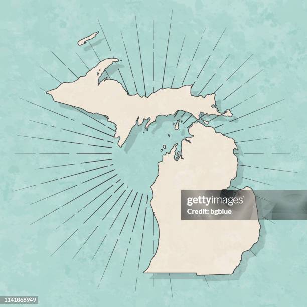 michigan-karte im retro-vintage-stil-altes strukturiertes papier - michigan stock-grafiken, -clipart, -cartoons und -symbole