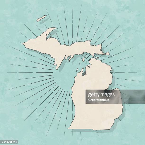 michigan map in retro vintage style - old textured paper - michigan stock illustrations
