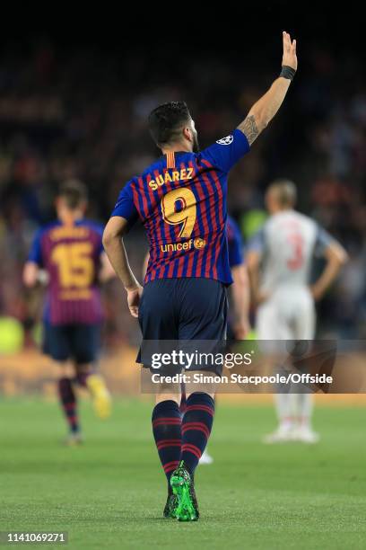 Luis Suarez of Barcelona apologises to the Liverpool fans as he celebrates after scoring their 1st goal during the UEFA Champions League Semi Final...