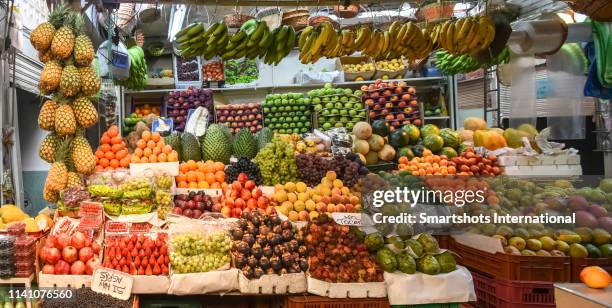 exotic tropical fruit in paloquemao market, bogota, colombia - mercado colombia fotografías e imágenes de stock