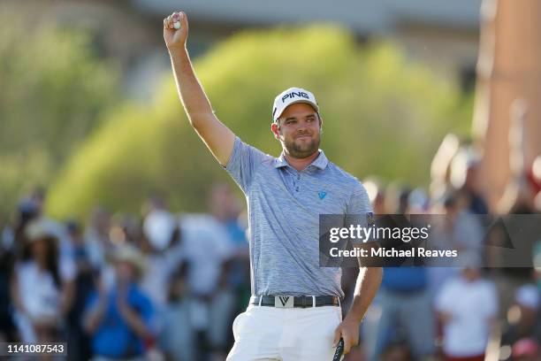 Corey Conners of Canada celebrates on the 18th green after winning the 2019 Valero Texas Open at TPC San Antonio Oaks Course on April 07, 2019 in San...