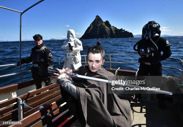 Members of the 501st Legion Ireland Garrison dressed as the Star Wars characters Rey, an Imperial officer, a TIE Fighter pilot and a Snowtrooper pose...