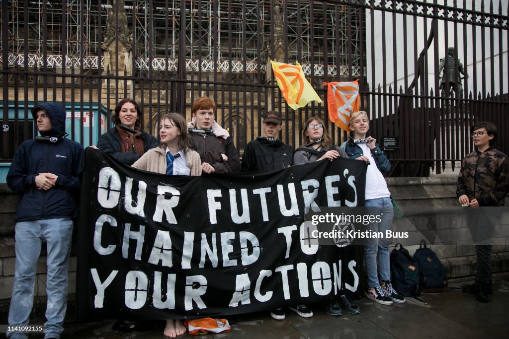 Extinction Rebellion Youths Locked On To Parliament In Direct Action Against Climate Change