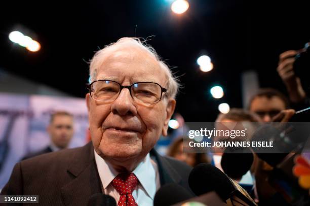 Warren Buffett , CEO of Berkshire Hathaway, speaks to the press as he arrives at the 2019 annual shareholders meeting in Omaha, Nebraska, May 4, 2019.