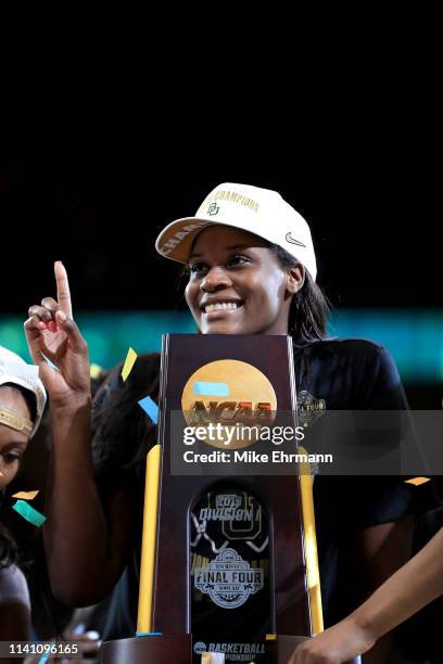 Kalani Brown of the Baylor Lady Bears celebrates with the trophy after the 82-81 win over the Notre Dame Fighting Irish to win the championship game...
