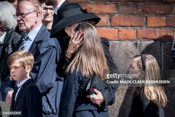 Danish Crown Princess Mary comforts her daughter princess Isabella next to prince Vincent and princess Josephine during the funeral service for the...