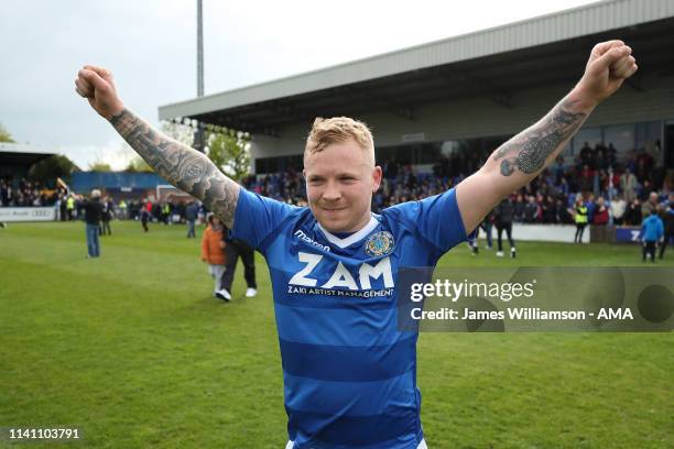 Elliott Durrell of Macclesfield Town celebrates at full time of the Sky Bet League Two match between Macclesfield Town and Cambridge United at Moss...