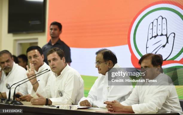 Congress President Rahul Gandhi addresses a press conference along with party leaders P. Chidamabaram, Ahmed Patel, Randeep Singh Surjewala, Anand...