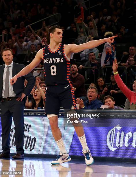 Mario Hezonja of the New York Knicks celebrates his three point shot by pointing to the Washington Wizards bench at Madison Square Garden on April...