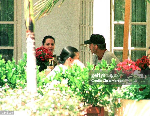 First photos of actress Angelina Jolie, and her new actor husband, Billy Bob Thornton, sharing a romantic lunch together under the warm Californian...