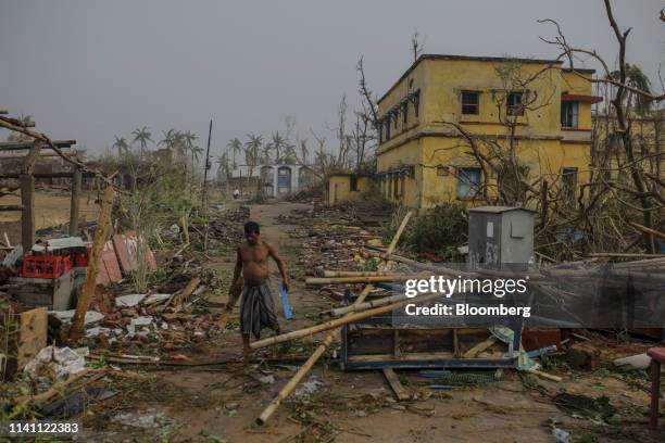 Man clears debris after Cyclone Fani passed through Puri, Odisha, India, on Saturday, May 4, 2019. A category 4 storm with strong wind and heavy rain...