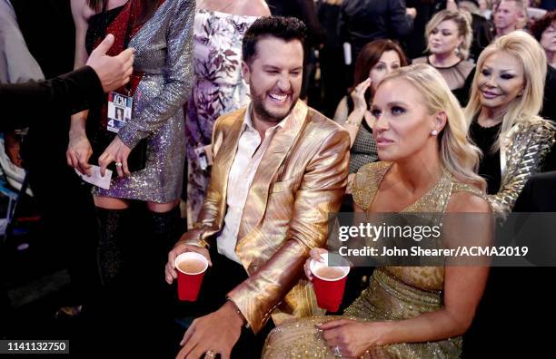 Luke Bryan and Caroline Boyer pose in the audience during the 54th Academy Of Country Music Awards at MGM Grand Garden Arena on April 07, 2019 in Las...