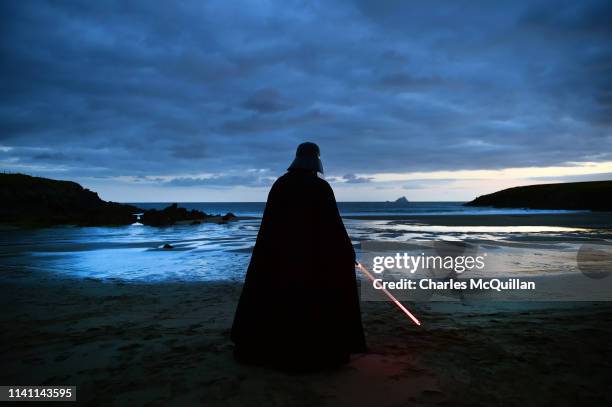 501st Garrison Ireland Leigon member John O'Dwyer dressed as the character Darth Vader looks out towards Skellig Michael island on May 4, 2019 in...