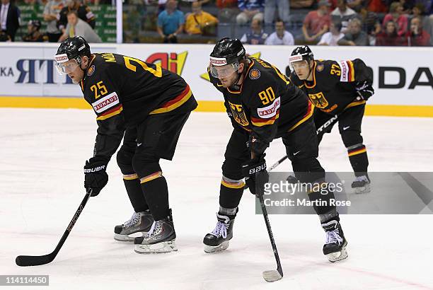 Marcel Mueller and Constantin Braun of Germany look on during the IIHF World Championship quarter final match between Sweden and Germany at Orange...