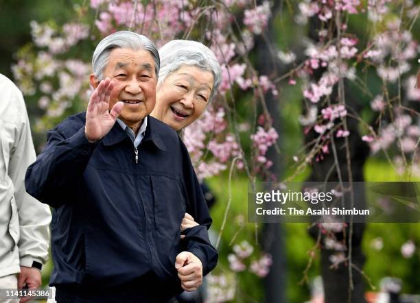 Emperor Akihito and Empress Michiko take a brief stroll outside the Imperial Palace on April 7, 2019 in Tokyo, Japan.