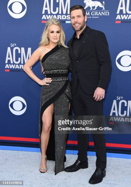 Carrie Underwood and Mike Fisher attend the 54th Academy of Country Music Awards at MGM Grand Garden Arena on April 07, 2019 in Las Vegas, Nevada.