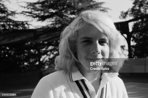 American actor and filmmaker Darby Hinton poses in tennis wear on a tennis court, United States, circa 1978.