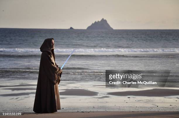 501st Garrison Ireland Leigon member Alan Bell dressed as the character Obi Wan Kenobi looks out towards Skellig Michael island on May 4, 2019 in...